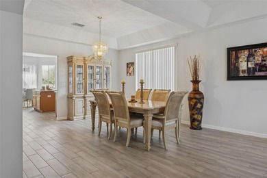 Beautiful well-maintained home on a gorgeous golf course lot in on Heritage Isles Golf and Country Club in Florida - for sale on GolfHomes.com, golf home, golf lot