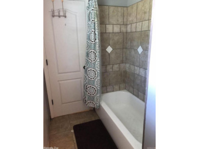 Great Location in town with swimming pool (new liner about 2 on  in Arkansas - for sale on GolfHomes.com, golf home, golf lot