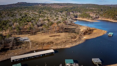 Don't miss this rare opportunity to own a premium lakefront lot on Indian Hills Country Club in Arkansas - for sale on GolfHomes.com, golf home, golf lot
