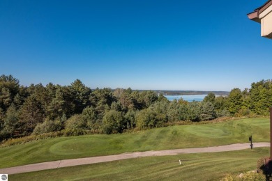 Wonderful views of Lake Bellaire are yours to enjoy from this on Shanty Creek Golf Course in Michigan - for sale on GolfHomes.com, golf home, golf lot