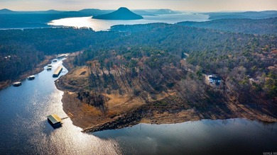 Don't miss this rare opportunity to own a premium lakefront lot on Indian Hills Country Club in Arkansas - for sale on GolfHomes.com, golf home, golf lot