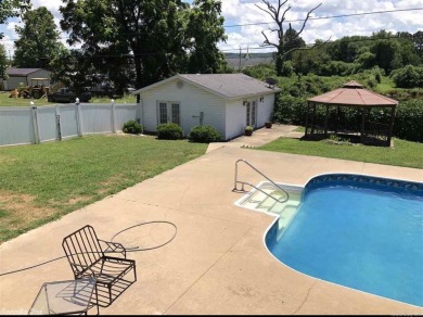 Great Location in town with swimming pool (new liner about 2 on  in Arkansas - for sale on GolfHomes.com, golf home, golf lot