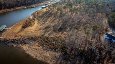 Don't miss this rare opportunity to own a premium lakefront lot on Indian Hills Country Club in Arkansas - for sale on GolfHomes.com, golf home, golf lot