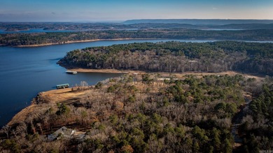Don't miss this rare opportunity to own a premium lakefront lot on Indian Hills Country Club in Arkansas - for sale on GolfHomes.com, golf home, golf lot