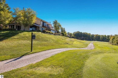 Wonderful views of Lake Bellaire are yours to enjoy from this on Shanty Creek Golf Course in Michigan - for sale on GolfHomes.com, golf home, golf lot