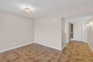 Step into this beautifully updated 2-bedroom, 2-bath first-floor on Palm Aire Country Club of Sarasota in Florida - for sale on GolfHomes.com, golf home, golf lot