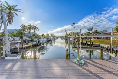 Waterfront Luxury Meets Eco-Friendly Living on Key Royale! on Key Royale Club in Florida - for sale on GolfHomes.com, golf home, golf lot