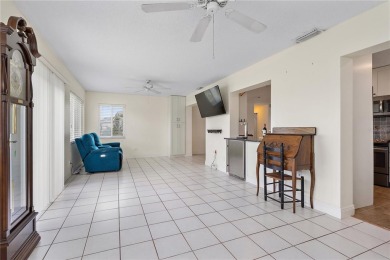 Welcome to your new home where comfort meets style in every on Mainlands Golf Club in Florida - for sale on GolfHomes.com, golf home, golf lot