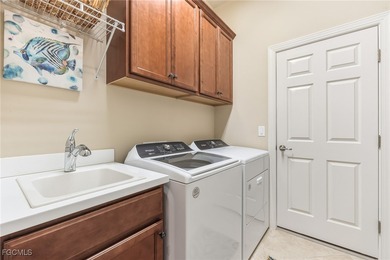 Luxury Living on the Golf Course: Your Florida Oasis. Nestled in on The Plantation Golf and Country Club in Florida - for sale on GolfHomes.com, golf home, golf lot