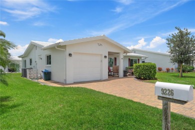 Welcome to your new home where comfort meets style in every on Mainlands Golf Club in Florida - for sale on GolfHomes.com, golf home, golf lot