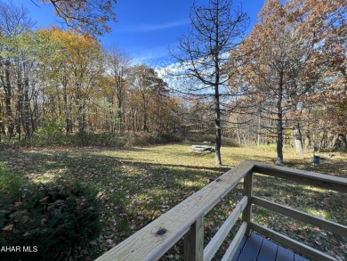 Perfect end unit and successful rental.  Turnkey 1st floor on Blue Knob Rec Area Golf Course in Pennsylvania - for sale on GolfHomes.com, golf home, golf lot