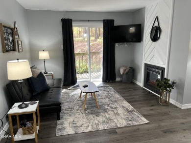Perfect end unit and successful rental.  Turnkey 1st floor on Blue Knob Rec Area Golf Course in Pennsylvania - for sale on GolfHomes.com, golf home, golf lot