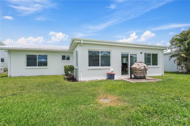 Welcome to your new home where comfort meets style in every on Mainlands Golf Club in Florida - for sale on GolfHomes.com, golf home, golf lot