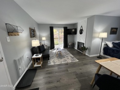 Perfect end unit and successful rental.  Turnkey 1st floor on Blue Knob Rec Area Golf Course in Pennsylvania - for sale on GolfHomes.com, golf home, golf lot