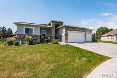 Discover this spacious 6-bedroom, 3-bathroom home nestled in the on Teton Lakes Golf Courses in Idaho - for sale on GolfHomes.com, golf home, golf lot