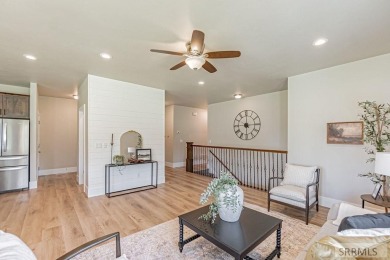Discover this spacious 6-bedroom, 3-bathroom home nestled in the on Teton Lakes Golf Courses in Idaho - for sale on GolfHomes.com, golf home, golf lot