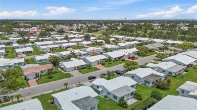 This stylish, comfortable gem is designed for easy living and on Mainlands Golf Club in Florida - for sale on GolfHomes.com, golf home, golf lot