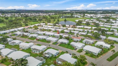 This stylish, comfortable gem is designed for easy living and on Mainlands Golf Club in Florida - for sale on GolfHomes.com, golf home, golf lot
