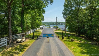 Are you looking for the perfect lakefront getaway? This on The Club At Porto Cima in Missouri - for sale on GolfHomes.com, golf home, golf lot