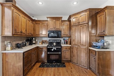 Nestled within the highly desirable Rockwood Subdivision, this on Paola Country Club in Kansas - for sale on GolfHomes.com, golf home, golf lot