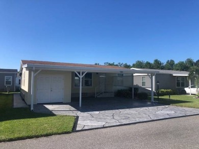 CYPRESS CREEK VILLAGE #297 - 2BED / 2 BATH / 1,200 SF. / $136 on Cypresswood Golf and Country Club in Florida - for sale on GolfHomes.com, golf home, golf lot