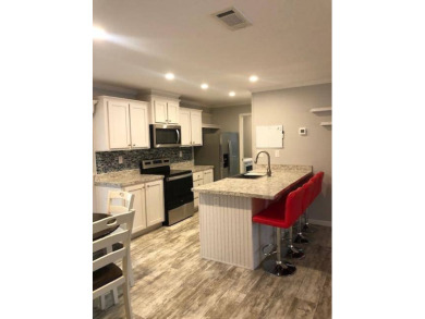 CYPRESS CREEK VILLAGE #297 - 2BED / 2 BATH / 1,200 SF. / $136 on Cypresswood Golf and Country Club in Florida - for sale on GolfHomes.com, golf home, golf lot