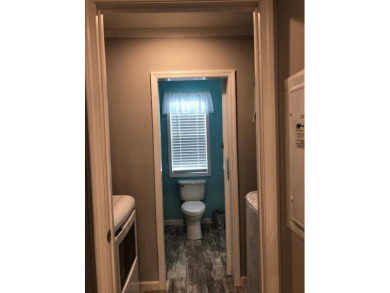 CYPRESS CREEK VILLAGE #297 - 2BED / 2 BATH / 1,200 SF. / $136 on Cypresswood Golf and Country Club in Florida - for sale on GolfHomes.com, golf home, golf lot