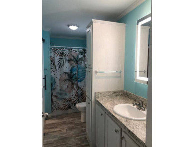 CYPRESS CREEK VILLAGE #297 - 2BED / 2 BATH / 1,200 SF. / $136 on Cypresswood Golf and Country Club in Florida - for sale on GolfHomes.com, golf home, golf lot