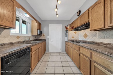 Welcome to golf course living in Sun City, perfectly positioned on Sun City South Golf Course in Arizona - for sale on GolfHomes.com, golf home, golf lot