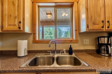 This Charming Cabin is Ready for You-  Fully Furnished and on Island Park Village Resort Golf Course in Idaho - for sale on GolfHomes.com, golf home, golf lot