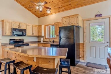 This Charming Cabin is Ready for You-  Fully Furnished and on Island Park Village Resort Golf Course in Idaho - for sale on GolfHomes.com, golf home, golf lot