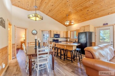 This Charming Cabin is Ready for You-  Fully Furnished and on Island Park Village Resort Golf Course in Idaho - for sale on GolfHomes.com, golf home, golf lot