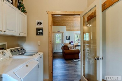 This Charming Cabin is Ready for You-  Fully Furnished and on Island Park Village Resort Golf Course in Idaho - for sale on GolfHomes.com, golf home, golf lot