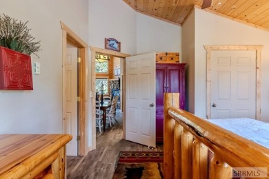 This Charming Cabin is Ready for You-  Fully Furnished and on Island Park Village Resort Golf Course in Idaho - for sale on GolfHomes.com, golf home, golf lot