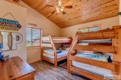 This Charming Cabin is Ready for You-  Fully Furnished and on Island Park Village Resort Golf Course in Idaho - for sale on GolfHomes.com, golf home, golf lot