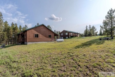 This Charming Cabin is Ready for You-  Fully Furnished and on Island Park Village Resort Golf Course in Idaho - for sale on GolfHomes.com, golf home, golf lot