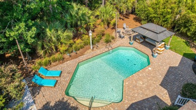 Discover unparalleled coastal living in this meticulously on Dunes West Golf Club in South Carolina - for sale on GolfHomes.com, golf home, golf lot