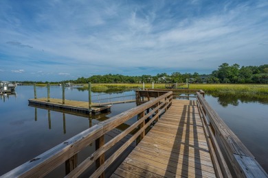Discover unparalleled coastal living in this meticulously on Dunes West Golf Club in South Carolina - for sale on GolfHomes.com, golf home, golf lot