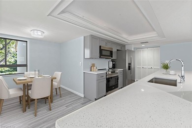 2 Bed + Den | 2 Bath | End-Unit Condo with Water & Golf Course on The Forest Country Club in Florida - for sale on GolfHomes.com, golf home, golf lot