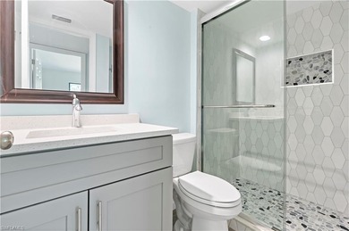 2 Bed + Den | 2 Bath | End-Unit Condo with Water & Golf Course on The Forest Country Club in Florida - for sale on GolfHomes.com, golf home, golf lot