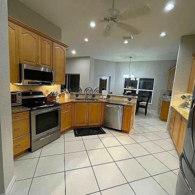 Enormous 3-Bedroom, 2-Bathroom Custom Home + Den in The on Sun n Lake Golf and Country Club in Florida - for sale on GolfHomes.com, golf home, golf lot