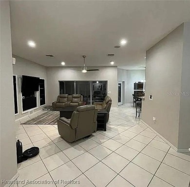 Enormous 3-Bedroom, 2-Bathroom Custom Home + Den in The on Sun n Lake Golf and Country Club in Florida - for sale on GolfHomes.com, golf home, golf lot