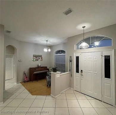 Enormous 3-Bedroom, 2-Bathroom Custom Home + Den in The on Sun n Lake Golf and Country Club in Florida - for sale on GolfHomes.com, golf home, golf lot