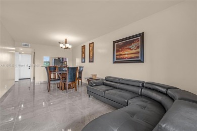 ENJOY A VIEW OF GOLF COURSE AND WATER FOR YOUR FUTURE HOME on Sunrise Lakes Phase IV Golf Course in Florida - for sale on GolfHomes.com, golf home, golf lot