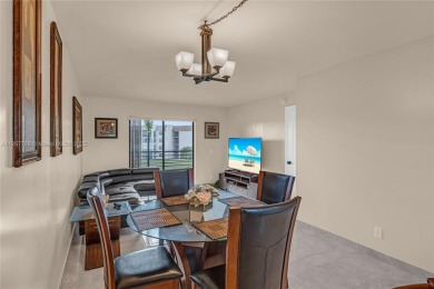ENJOY A VIEW OF GOLF COURSE AND WATER FOR YOUR FUTURE HOME on Sunrise Lakes Phase IV Golf Course in Florida - for sale on GolfHomes.com, golf home, golf lot
