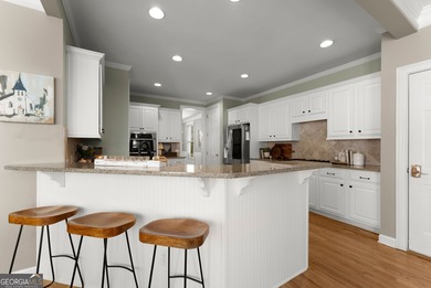 Welcome to a timeless John Wieland Kelsey Floor Plan in the on Reunion Golf Club in Georgia - for sale on GolfHomes.com, golf home, golf lot