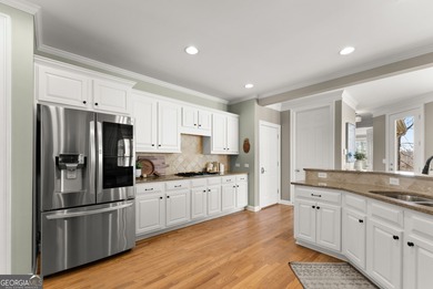 Welcome to a timeless John Wieland Kelsey Floor Plan in the on Reunion Golf Club in Georgia - for sale on GolfHomes.com, golf home, golf lot