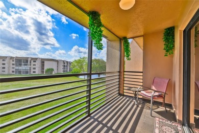 ENJOY A VIEW OF GOLF COURSE AND WATER FOR YOUR FUTURE HOME on Sunrise Lakes Phase IV Golf Course in Florida - for sale on GolfHomes.com, golf home, golf lot
