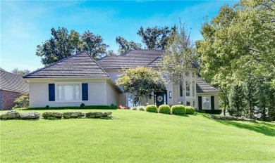 Welcome to this exquisite 1.5-story residence in the prestigious on Loch Lloyd Country Club in Missouri - for sale on GolfHomes.com, golf home, golf lot