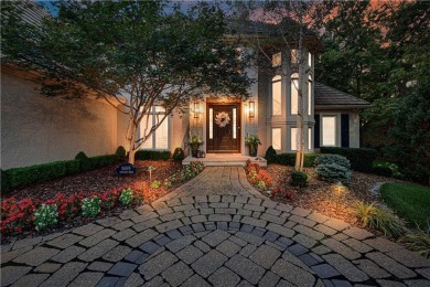 Welcome to this exquisite 1.5-story residence in the prestigious on Loch Lloyd Country Club in Missouri - for sale on GolfHomes.com, golf home, golf lot